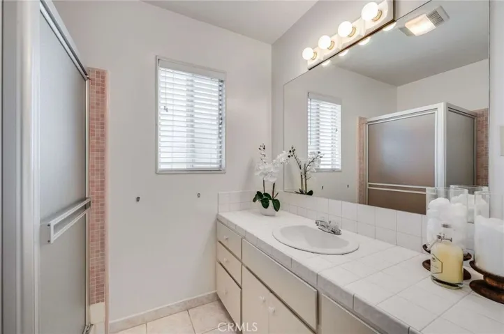 Light and bright 3/4 En Suite Bathroom attached to the Primary Bedroom