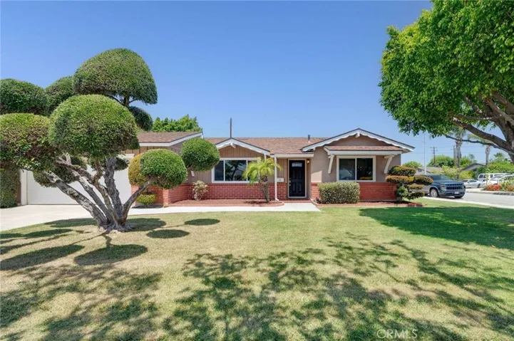 Great curb appeal with beautiful landscaping!