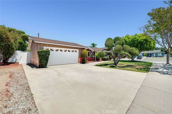 Large driveway...tons of parking, enough for 2 cars and a 2 car garage as well!