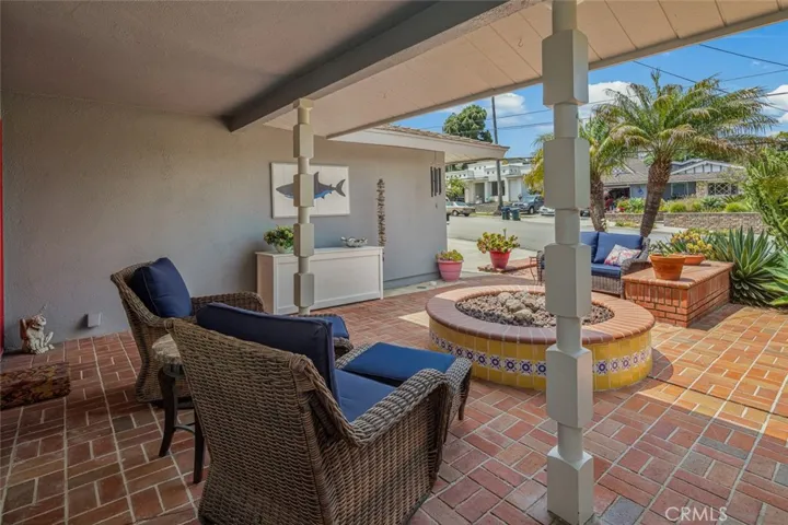 Access to patio from driveway as well as the street.