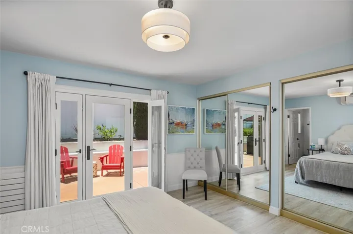 Large mirrored dual closets completes the room.