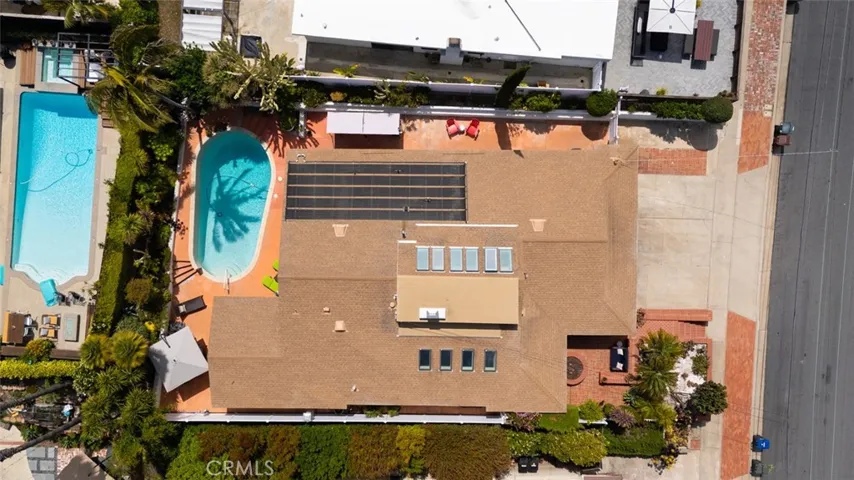 A view from over the house. the solar is to heat the pool. Of 10 skylight the loft have for sure been replaced recently and the living rooms installed with remodel.