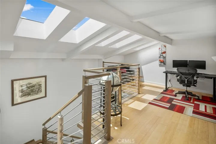 Truly beautifully natural lighting. 2 of the Sky Lights open for venitlation as well as A/C in this and all rooms throughout the house.