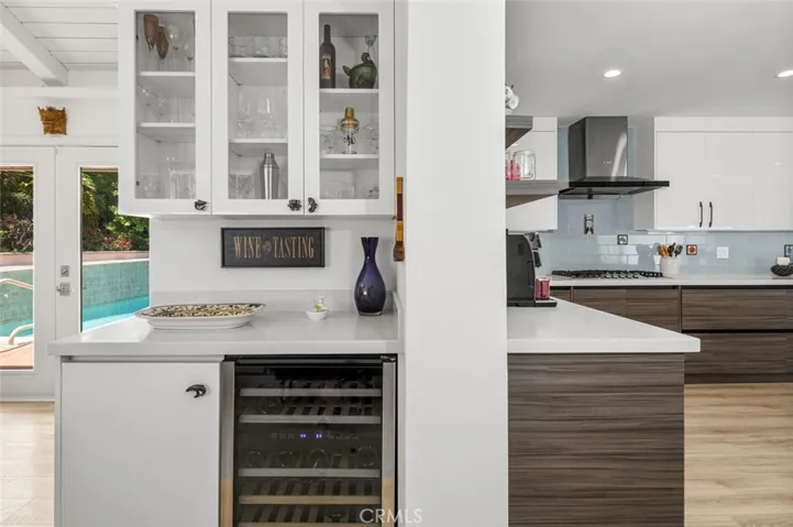 Leaving the kitchen to dining room, the use of space is completed by the Dry Bar.