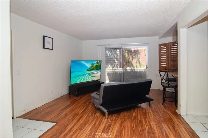 Family room with slider door to sideyard