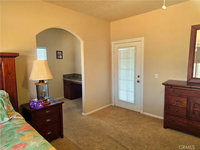 View of work station and private entry from bathroom.