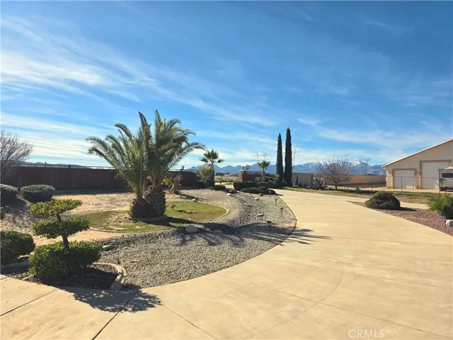 View of entry gate from front of home.
