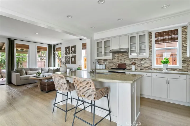Open concept layout with designer kitchen