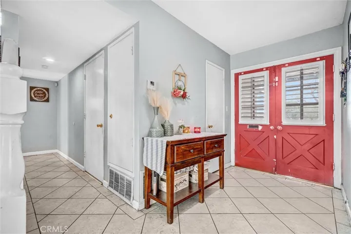 Hallway to garage/down-stairs bd/bt rooms