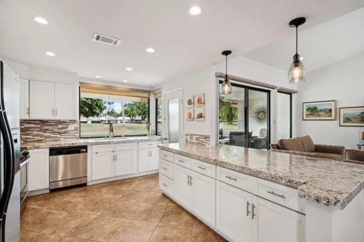 Open, functional kitchen with views