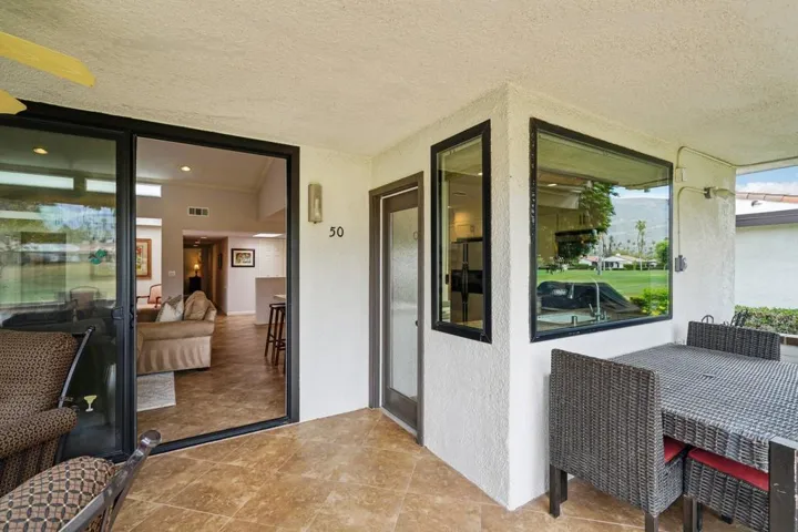 Patio with kitchen & living room access