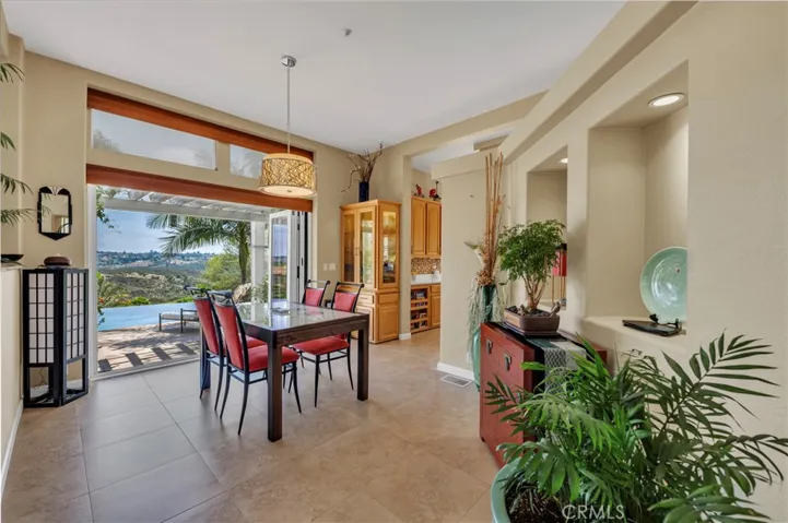 Dining area outside kitchen with Bifold doors