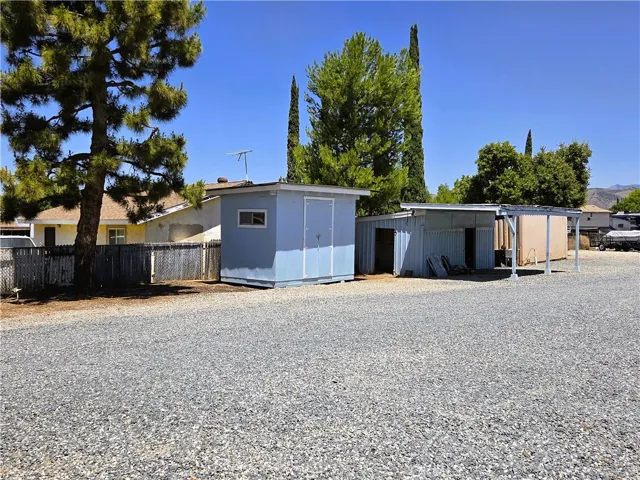 2 BLUE STORAGE BUILDINGS
