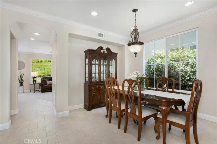 Dining room with picture window and the sweet smell of jasmine