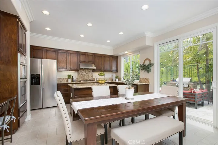 Spacious nook, tall new sliding door with the built in BBQ just steps away