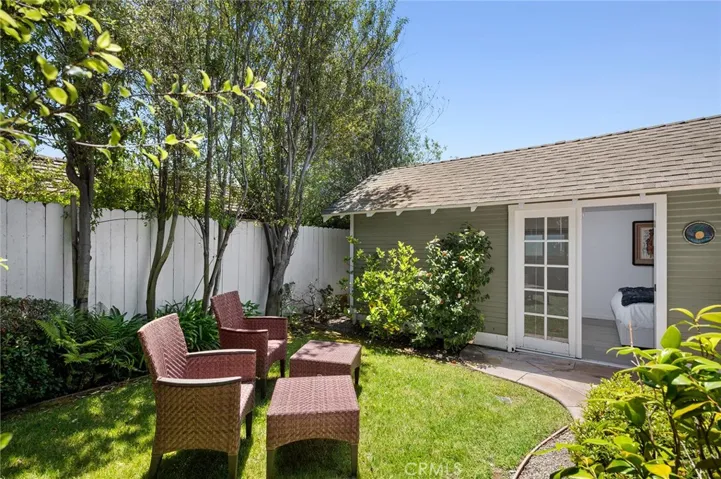 Set on an approximately 3,412-square-foot lot, this home offers seamless indoor-outdoor living with a private, expansive, professionally landscaped yard.