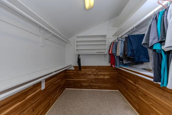 primary spacious walk-in closet, over 11 ft deep; has its own mini-skylight