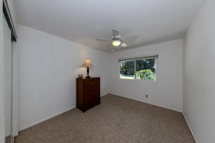 front left (bdrm 1) from doorway; views of pool and backyard