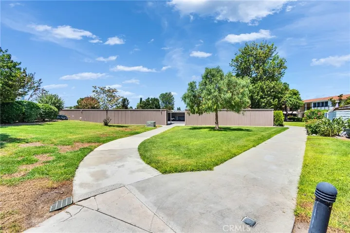 CLOSE TO CARPORT #12.