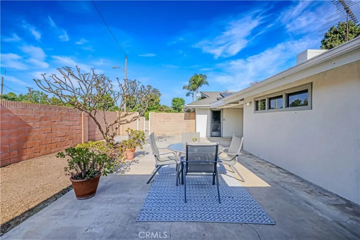 This space in the backyard could be space for a room addition or an ADU. This is off the dining room and office.