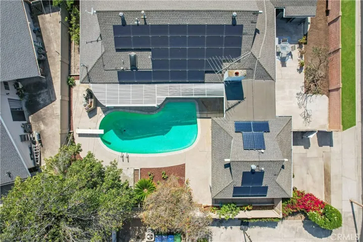 Solar Panels. Pool! Detached garage with breeze way.