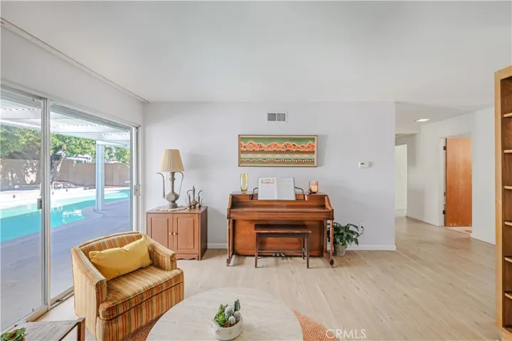 Large Sliding Glass doors to enjoy the pool view from your Living Room