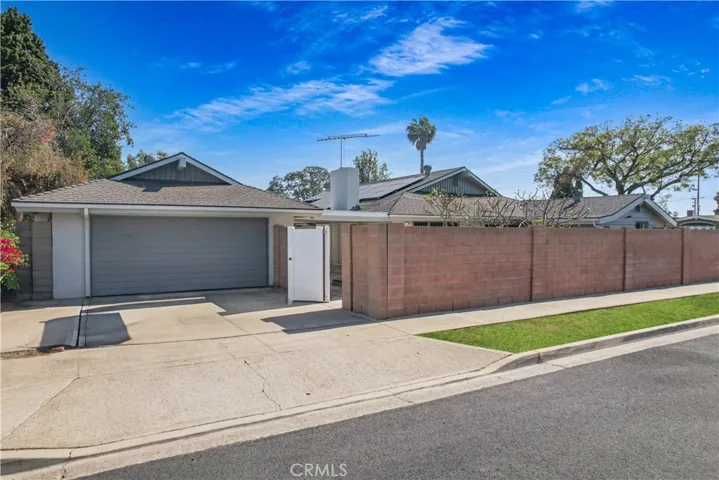 Detached 2-Car Garage. Entry from garage and also this white side gate.
