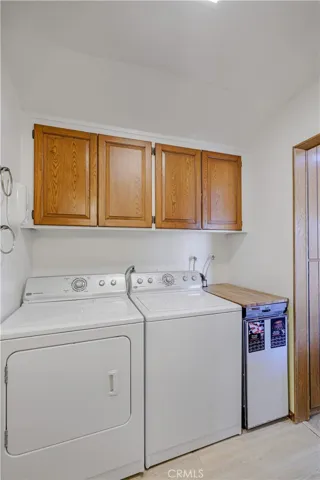 Laundry room separates the Kitchen and Office