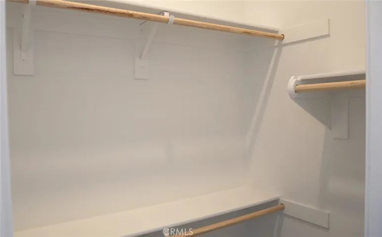 Downstairs Ensuite Walk-In Closet