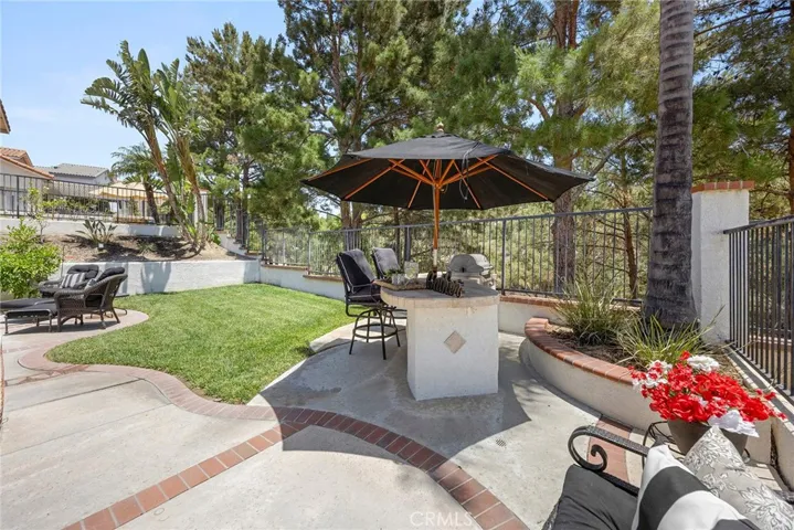 Pretty establish pine trees that add a since of nature to the yard