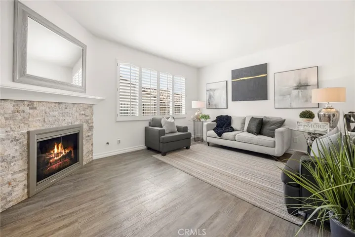 Pretty is this picture with a stone fireplace as it's backdrop