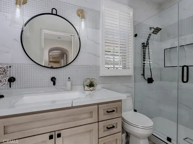 3/4 bath downstairs, adjacent to the guest room.