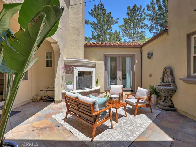 The central courtyard is a wonderful space year round. Doors open to many rooms, bringing the outdoors in.