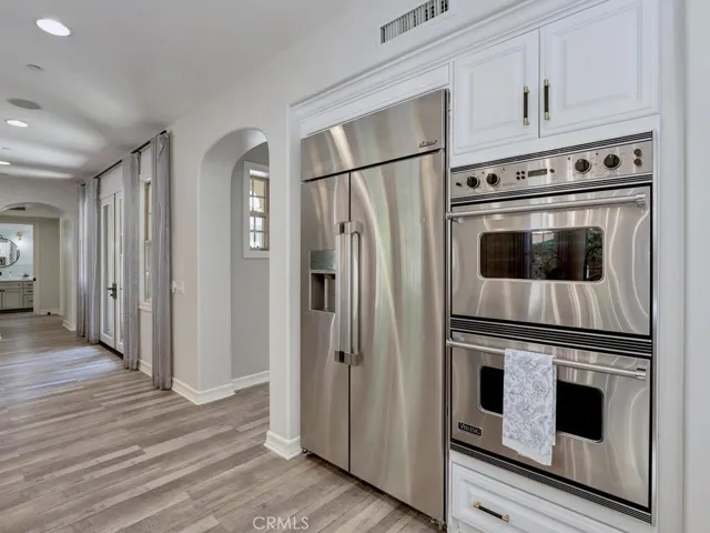 Dacor refrigerator, and Viking double ovens.