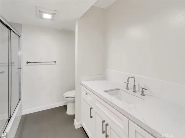 Hall Bath - quartz countertops.  Mirror has been Installed