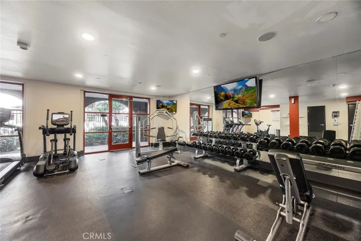 Enjoy top-notch community amenities including a resort-style pool, spa, sauna, fitness center, BBQ area, clubhouse with kitchen, and media lounge.