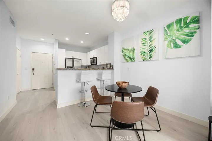 Plenty of places to gather together. Whether a casual perch at the kitchen island or a nice seat at the dining table, this home can accommodate all your entertaining requirements.