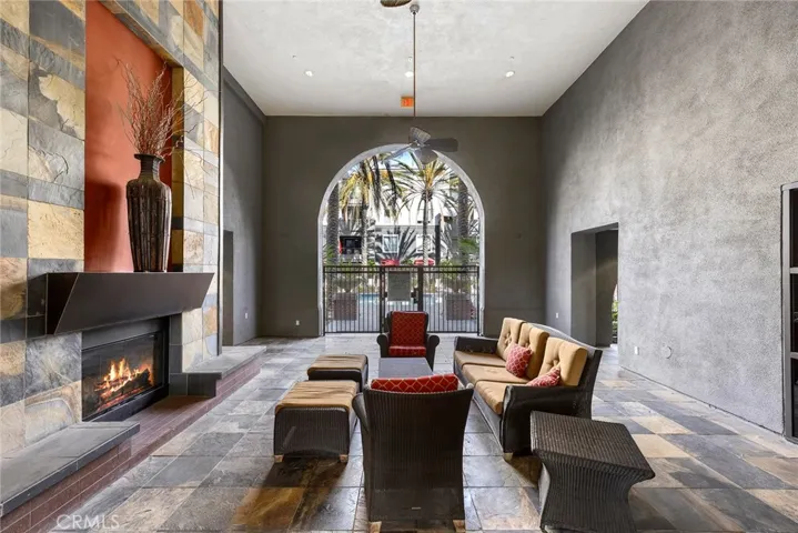 Imagine hosting gathering friends in this space adjacent to the pool area. It's completely covered so its protected from all the elements.