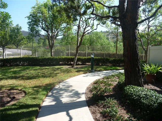 Pleasant walk way to the front of the unit.