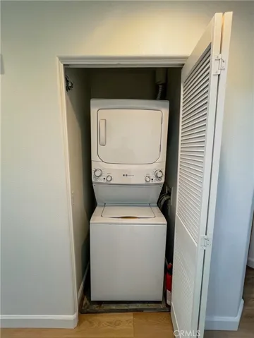 Stackable washer and dryer included.