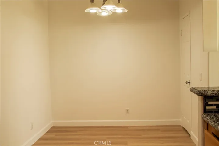 Dining area with walk in pantry.