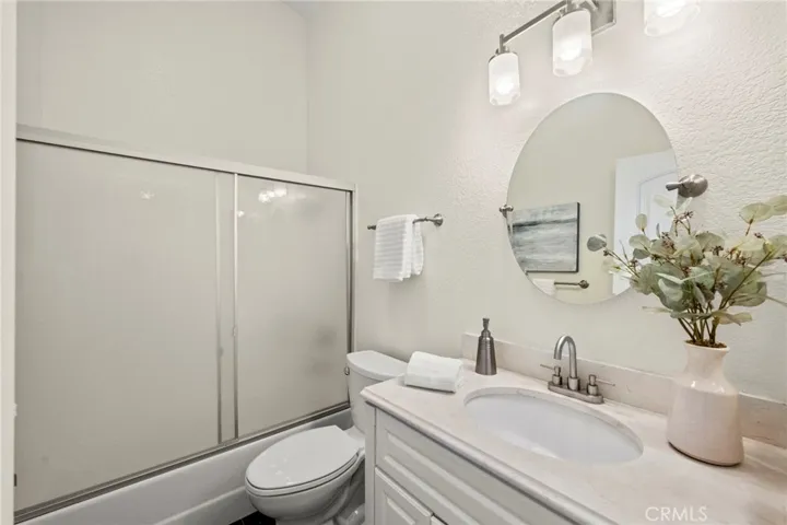2nd bathroom with tub and shower