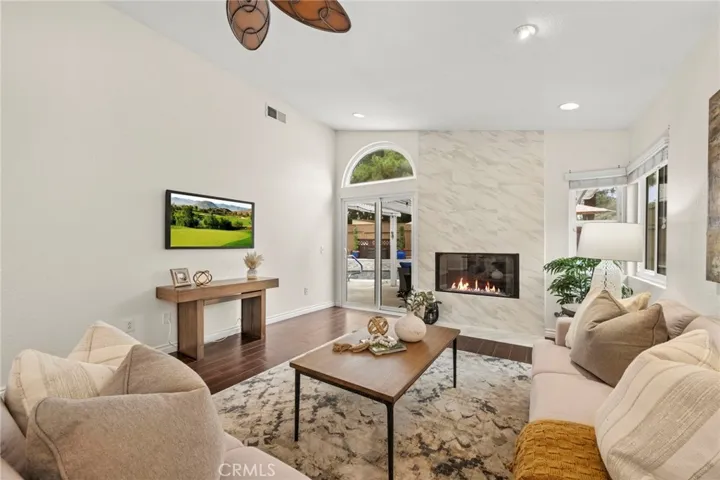 Stunning floor to ceiling tile fireplace.