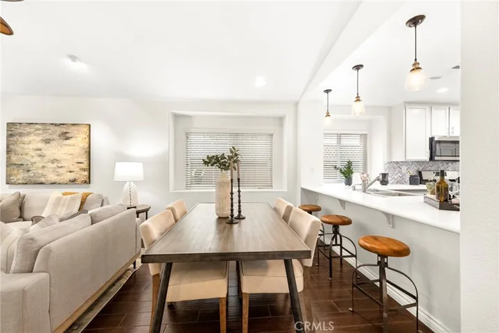 Dining room open to the kitchen and family room.
