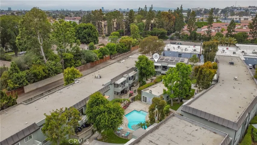 The pool is only steps away from the home.