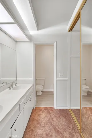Master Bathroom with Additional Mirrored Closet Space