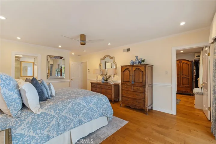 Master suite walk-in closet with pull down attic ladder.