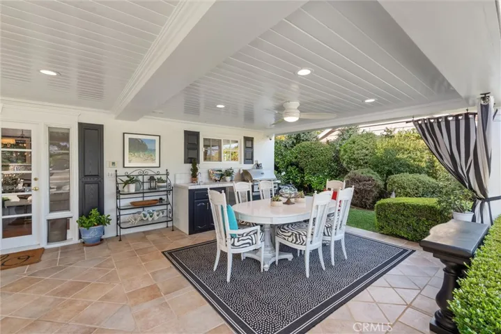Elegant outdoor dining and view of the 1/3 acre Oasis experience.