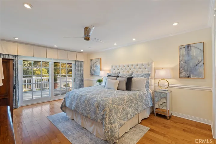 Ensuite master bedroom leading to the outdoor deck over looking the  Oasis view.