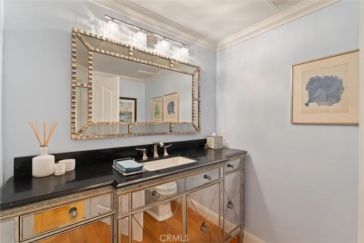 Main level half guest bathroom.